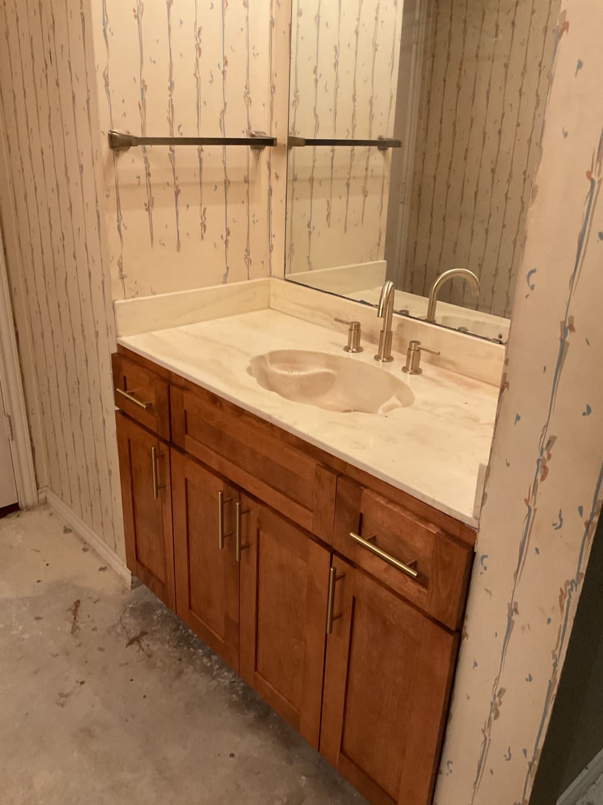 Bathroom vanity with wallpaper